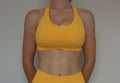 Form & Flow Halter Crop - Sunset